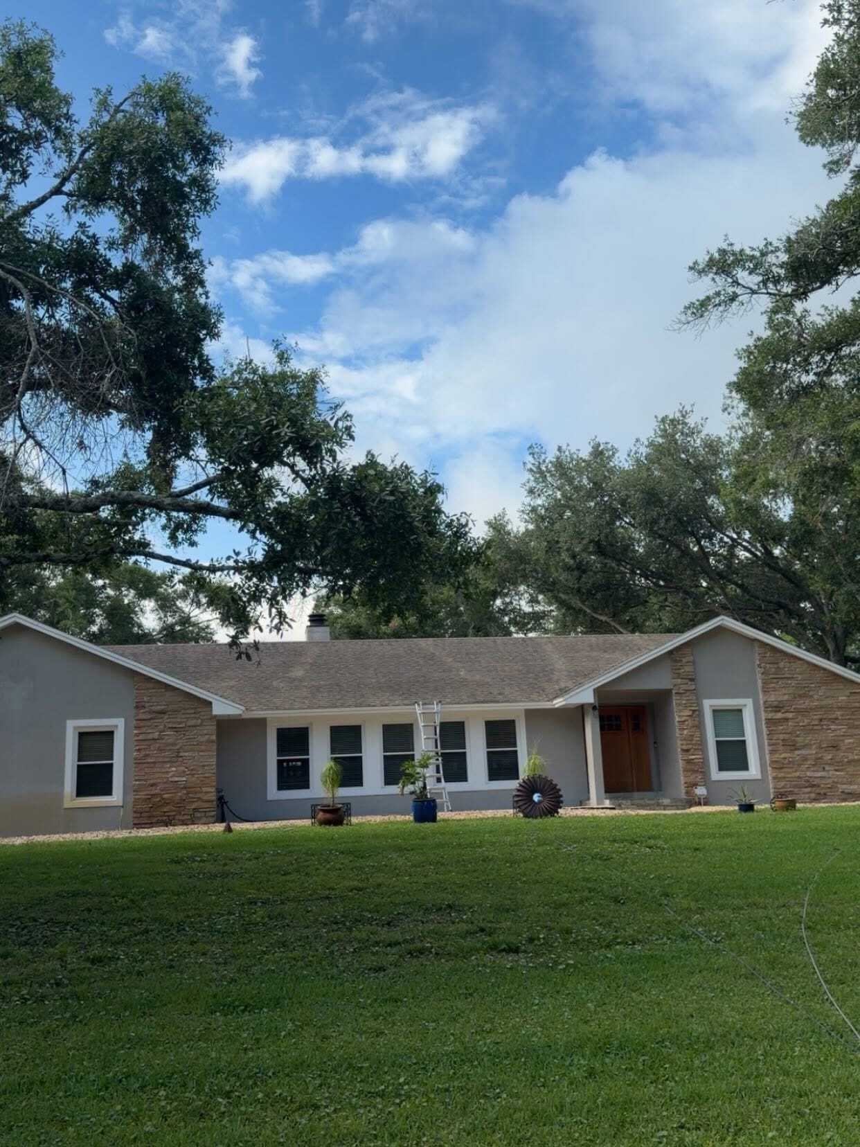 The same house exterior cleaned and brightened